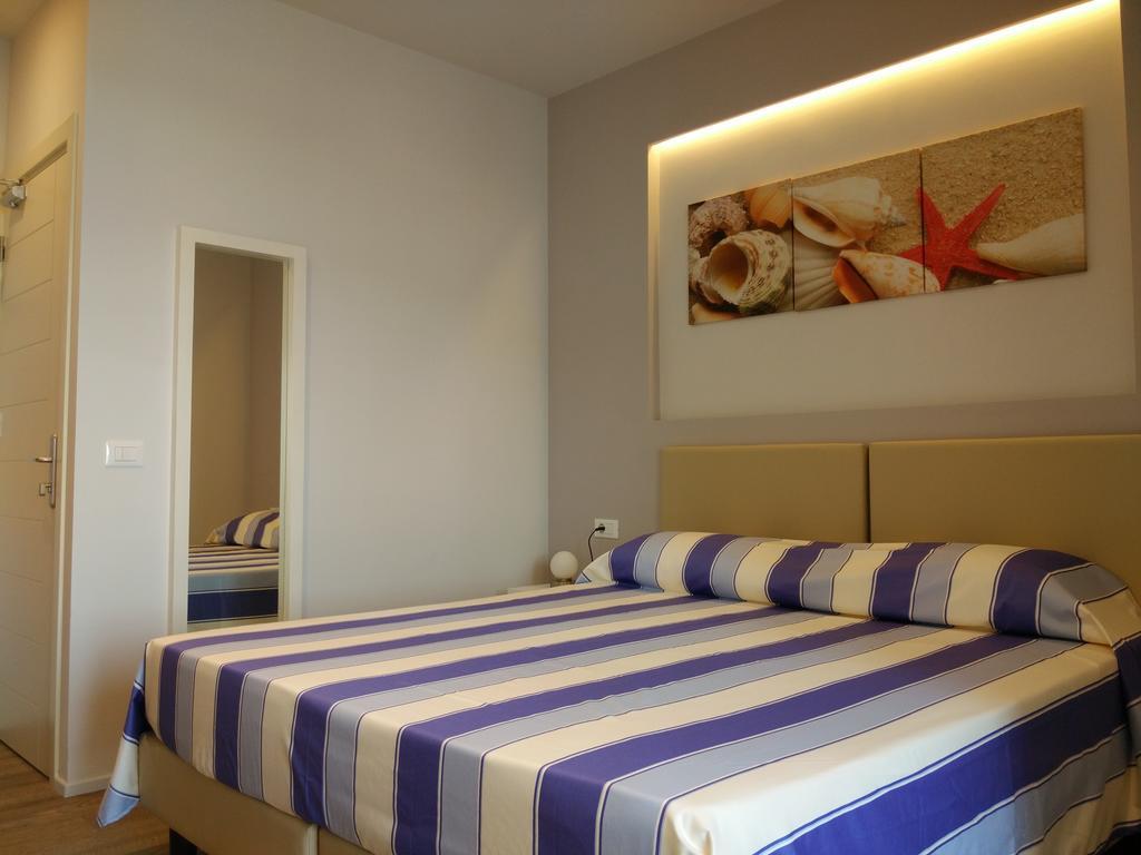 Hotel L'Approdo Порто-Аццурро Номер фото