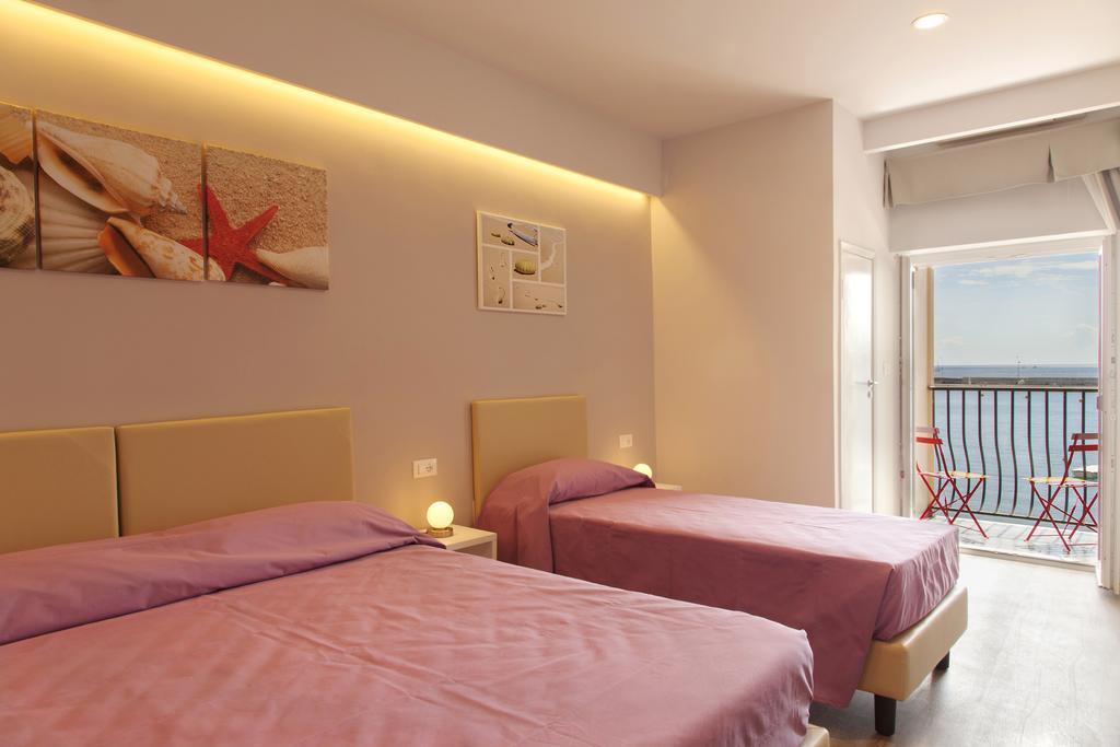 Hotel L'Approdo Порто-Аццурро Номер фото